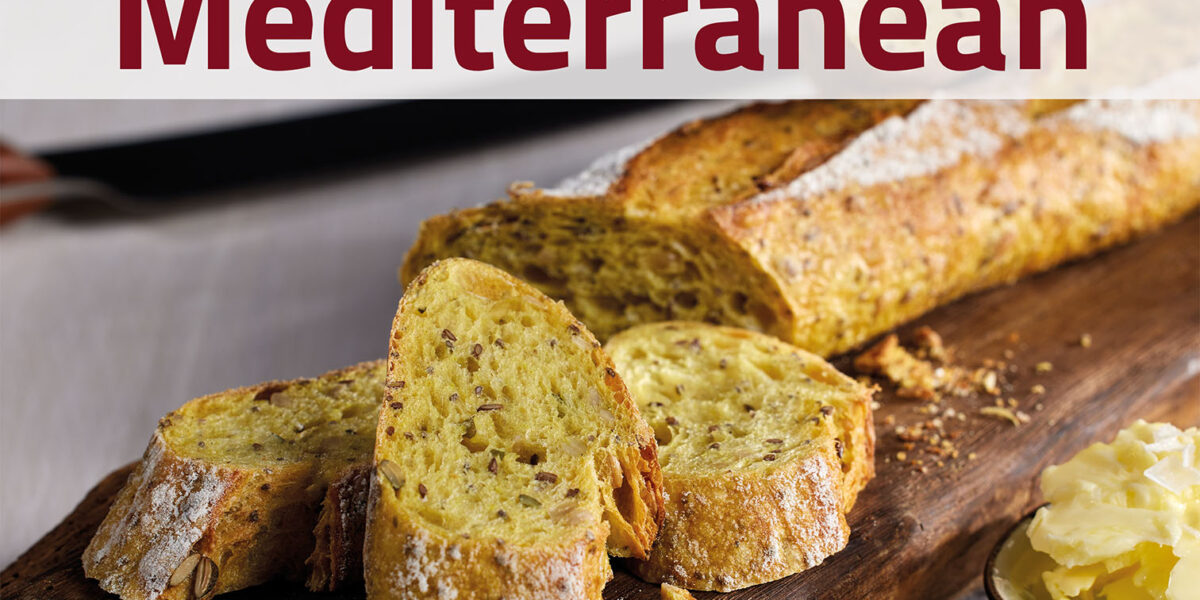 Rietmann Mediterran, Startkachel mit mediterranem Gebäck mit Chia-Samen, angeschnitten auf Brettchen
