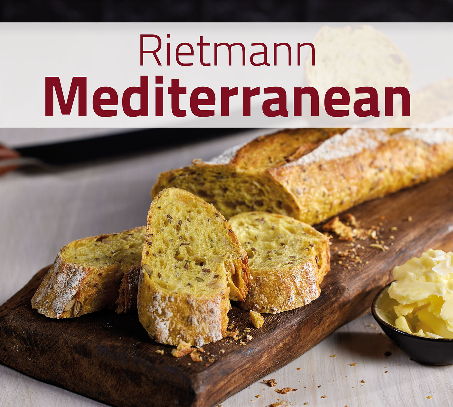 Rietmann Mediterran, Startkachel mit mediterranem Gebäck mit Chia-Samen, angeschnitten auf Brettchen